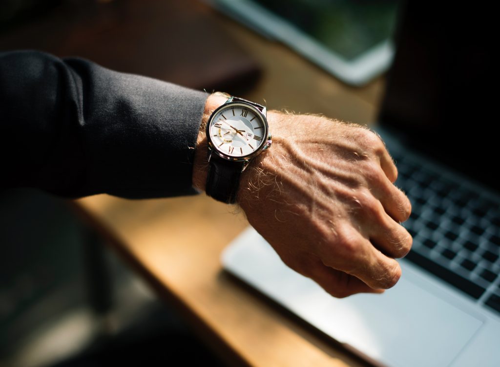 watch on mans arm