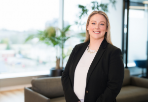 Smiling professional woman in modern office setting