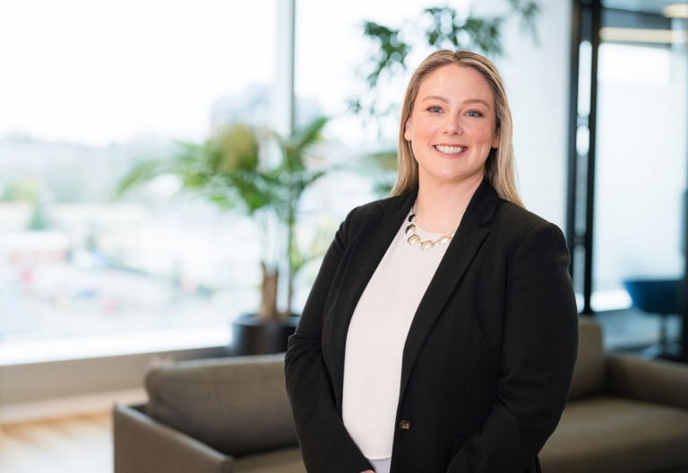 Smiling professional woman in modern office setting